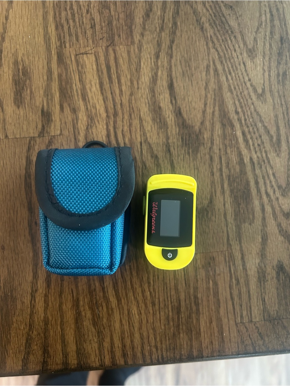Yellow Portable Pulse Oximeter with Blue Carry Case